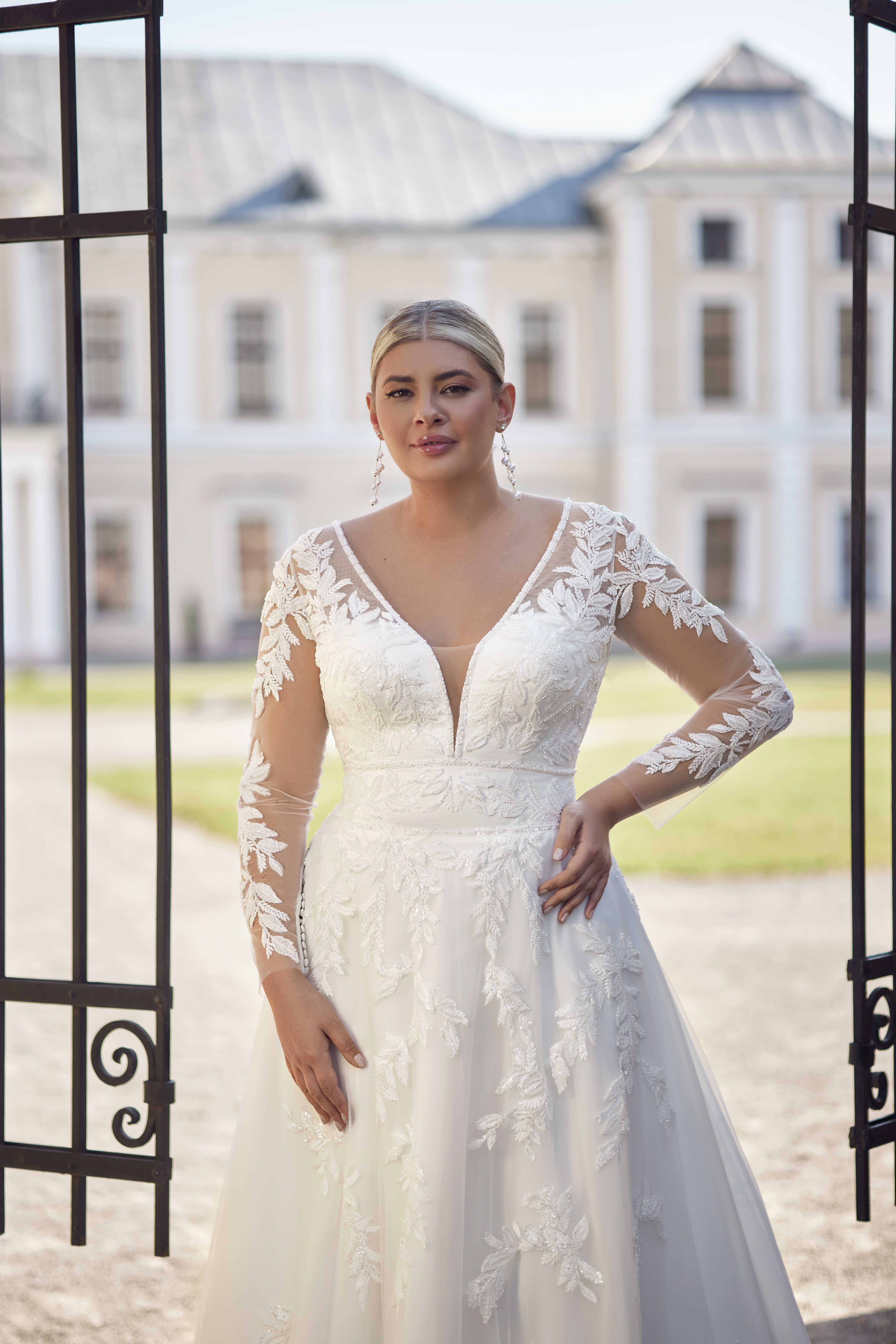 Tia prinsesse plus size brudekjole med blonde ærme 